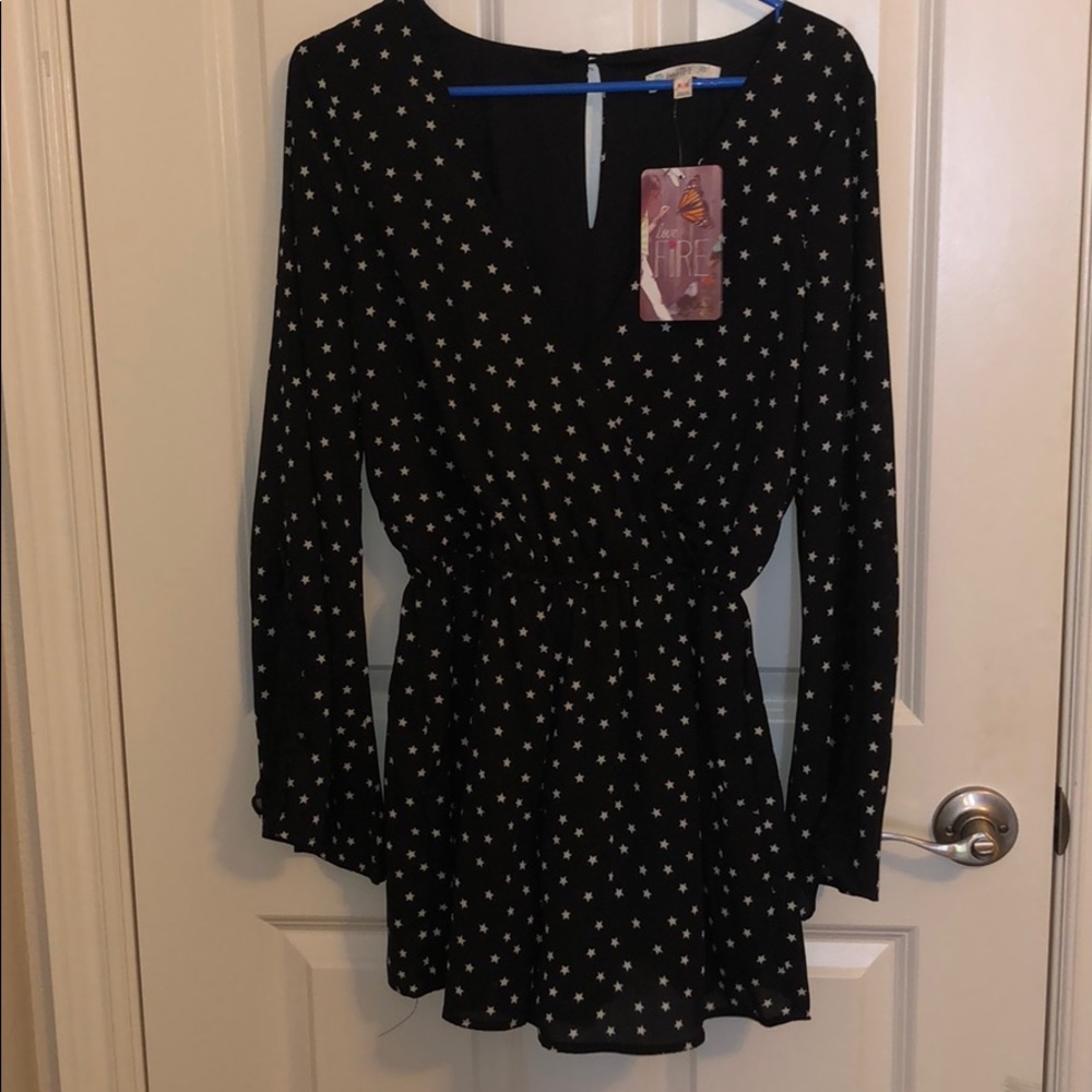 Star-pattered romper with lace detail on arms